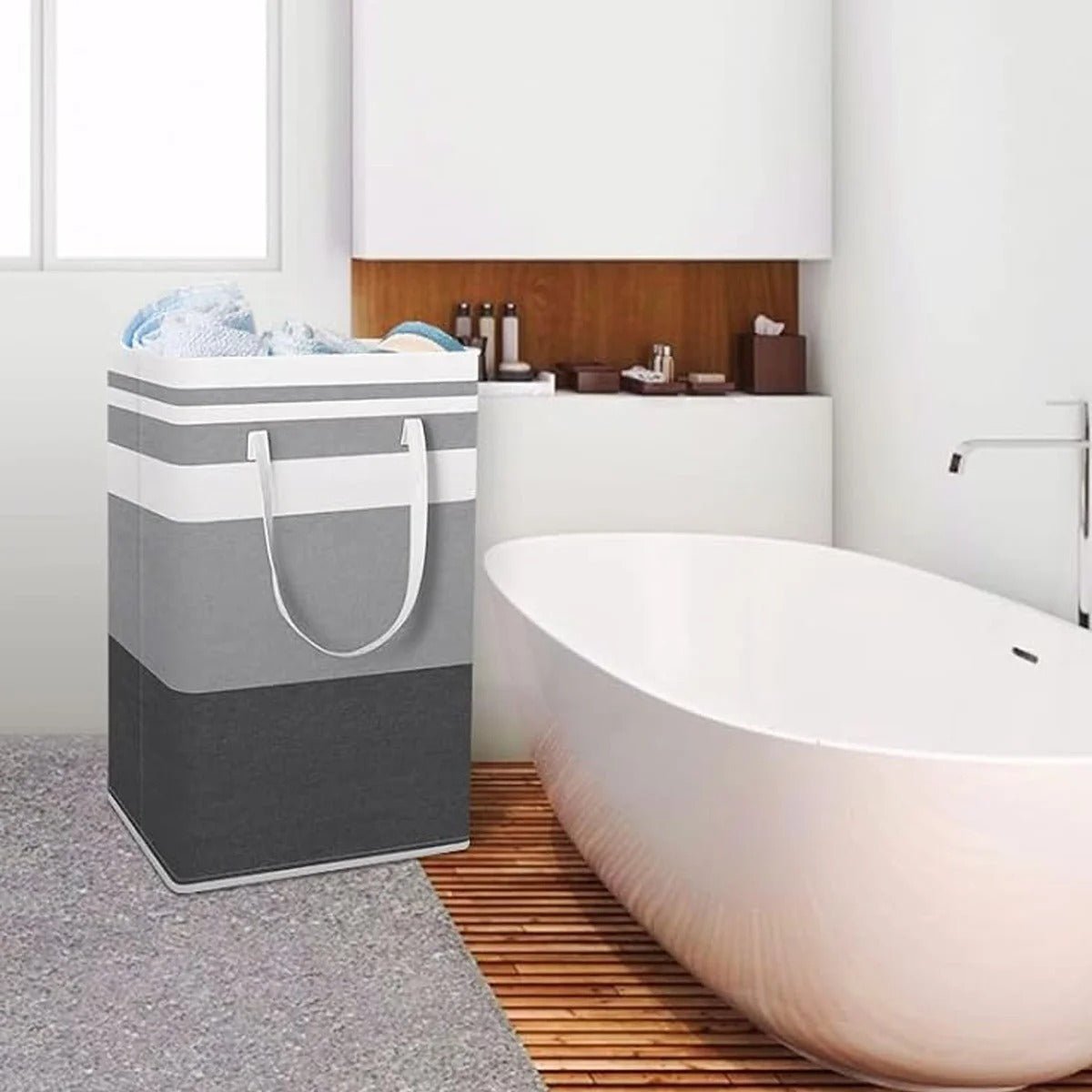 Panier à linge pliable | 75L - pres d'une baignoire